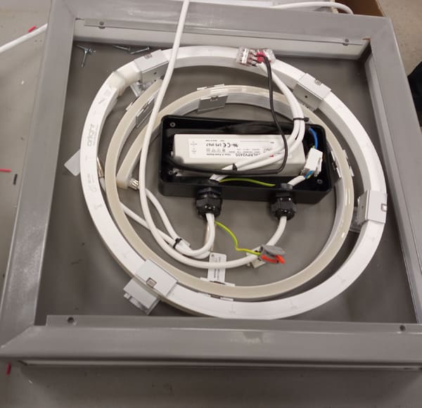 Close-up of a rewired external roof light with new driver