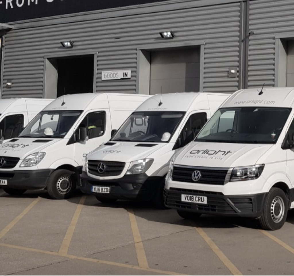 Orlight branded delivery vans at the warehouse